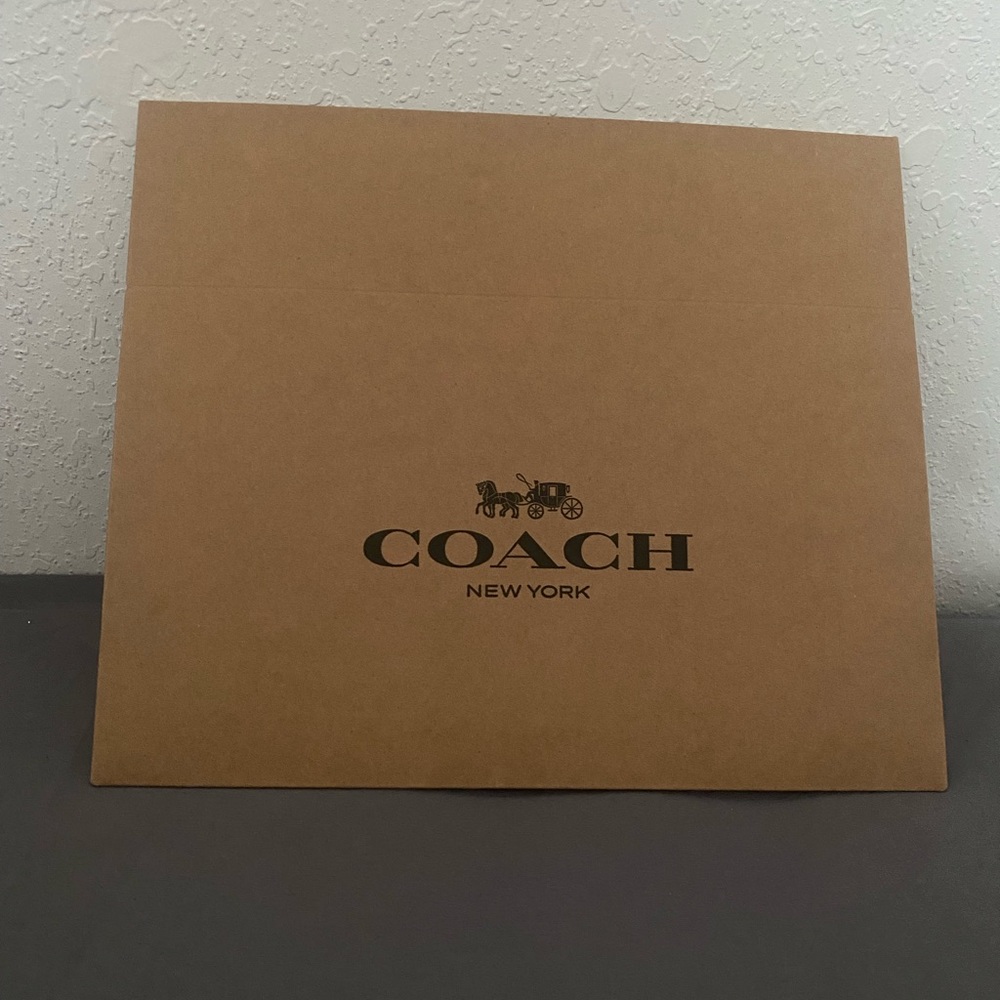 Coach box, brown with black writing, box is all 1 piece
